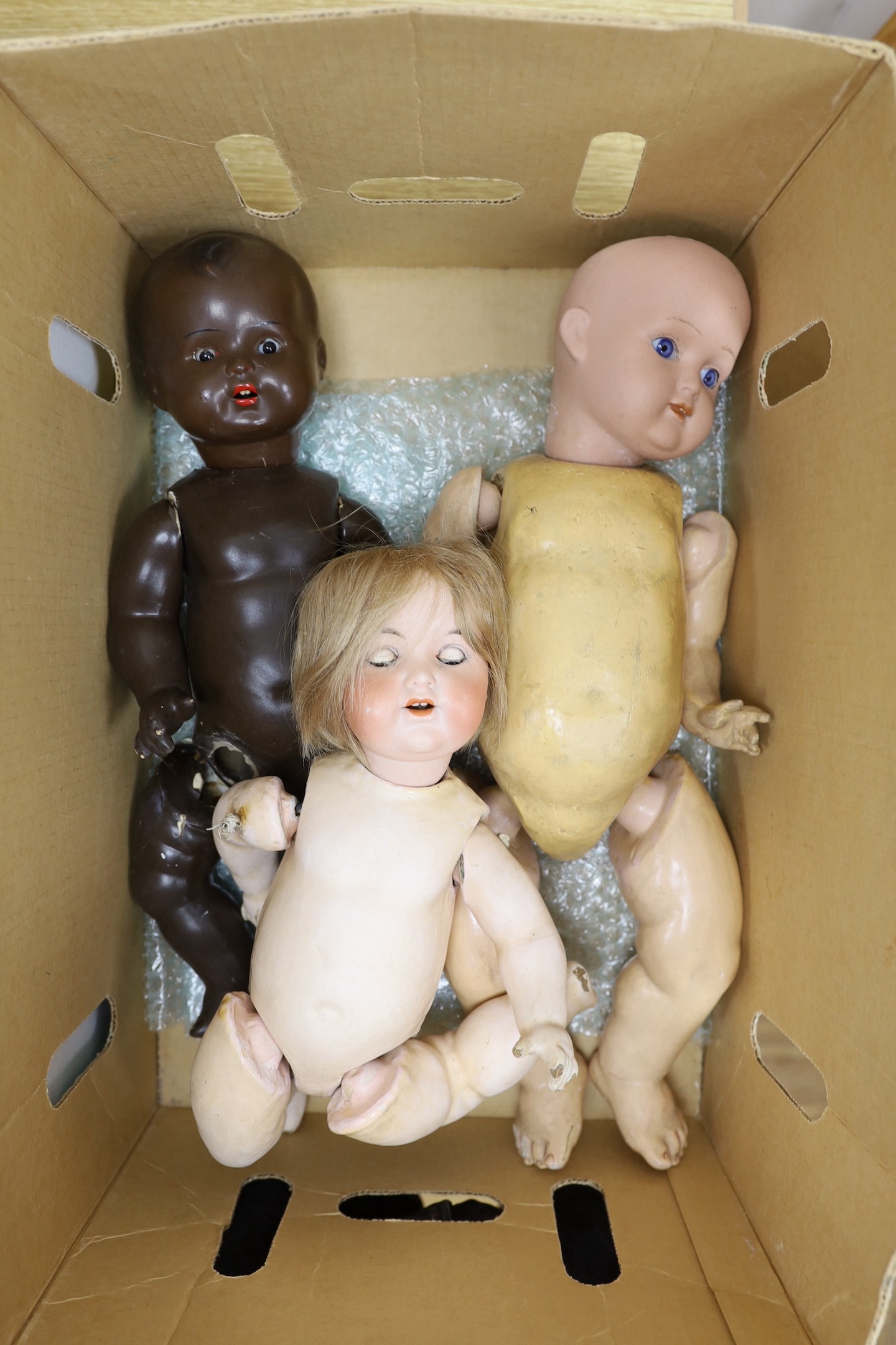 A collection of six 19th and 20th century various dolls